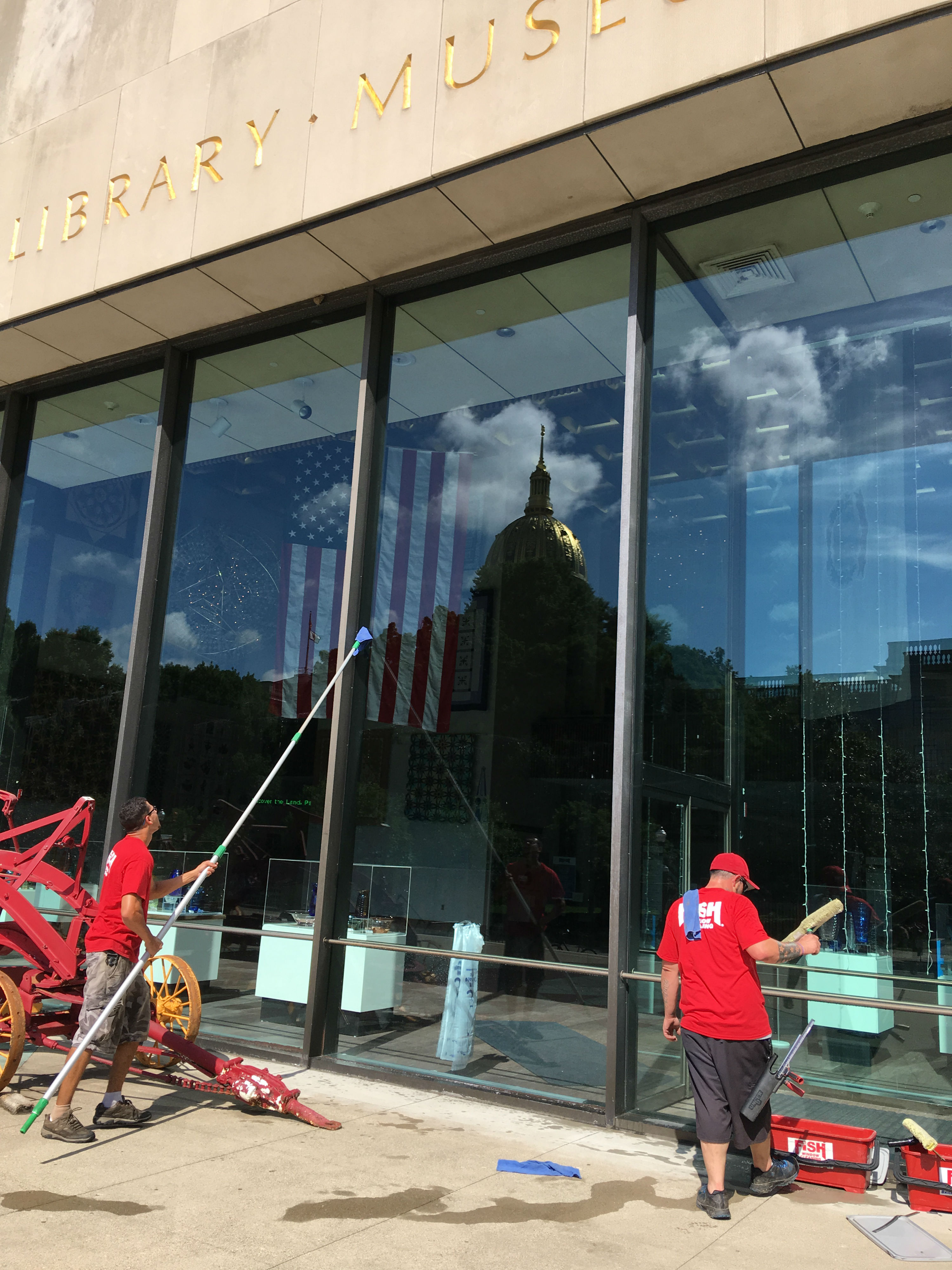 Image of Two Window Cleaners Cleaning Library Windows